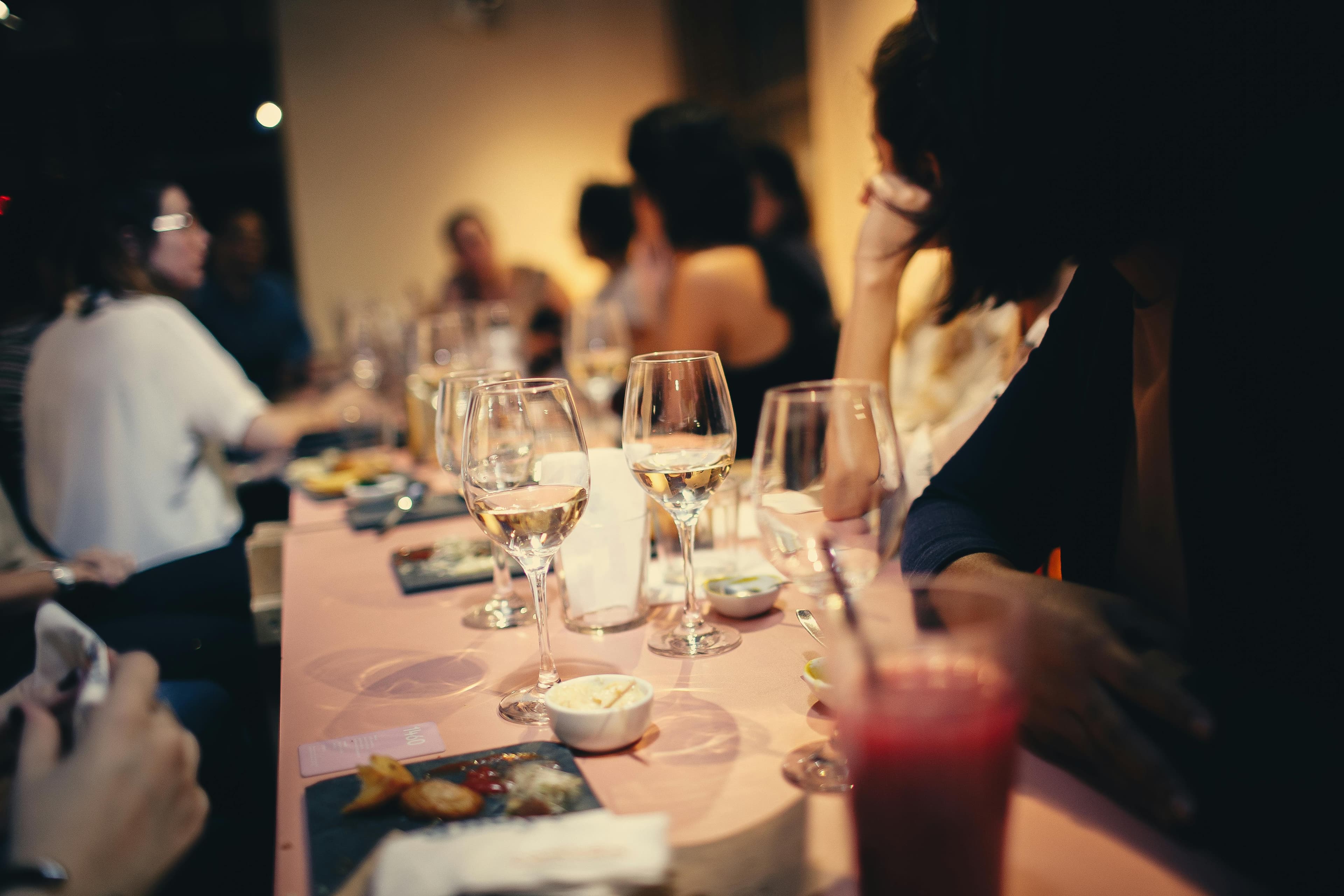 Corporate Events - people having wine in a restaurant